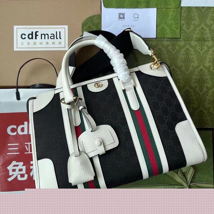G*u*i top handle bags
